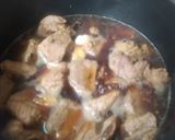 A picture of step 2 of Honey-Glazed Pork Ribs in a Pan.