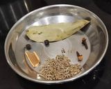 A picture of step 1 of Sindhi Style Brown Rice/Bhugga Chawal.
