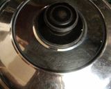 A picture of step 3 of Hara chana masala curry.