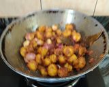 A picture of step 7 of ALOO DO PYAZA..