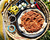 صورة لخطوة 3 من وصفة برغل على بندورة بالقاورما على الحطب