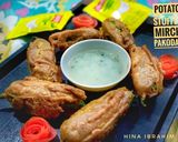 A picture of step 7 of Potato Stuffed Chilli Pakoray.