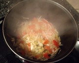 Foto del paso 2 de la receta: Manitas de cerdo con tomate