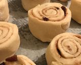 A picture of step 6 of Cinnabon with raisins.