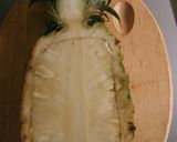A picture of step 6 of Fruit salad in a pineapple boat.