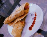 A picture of step 6 of Chicken paratha roll.