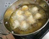 A picture of step 4 of Punugulu with red chatnee(evening snacks).