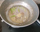A picture of step 12 of Prawn curry.