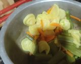 A picture of step 1 of Bisibelabath(Tamilnadu style)variety vegetables,rice,tuvar dal.