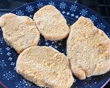 A picture of step 1 of Mother’s pork steak in breadcrumbs with cheese and tomatoes.