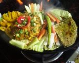 A picture of step 6 of Kathiyawadi Sizzler.
