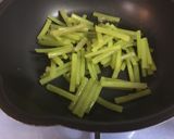 A picture of step 9 of Japanese Wild Grass (Fuki) Cooking.