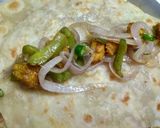 A picture of step 4 of Chicken kathi Roll.