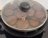 A picture of step 11 of Healthy Atta Jaggery Muffins in Appe Pan.