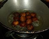 A picture of step 1 of Gulabjamun in rabri.