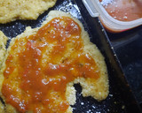 Foto del paso 2 de la receta: Milanesa a la napolitana con papas fritas y huevo