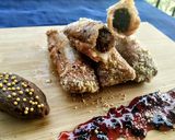A picture of step 10 of Znoud-el-sit with creamy choco hummus filling and red grape sauce.