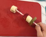A picture of step 7 of Fruit kabobs.