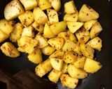 A picture of step 4 of Dahi ke Aloo.