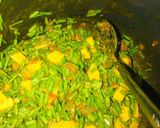 A picture of step 2 of Aloo mungra.