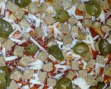 A picture of step 5 of Chicken Tikka Chunks Pizza.