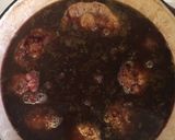 A picture of step 4 of Braised oxtail in a red wine reduction .