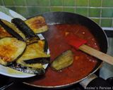 A picture of step 7 of Eggplatns onions with tomato sauce.