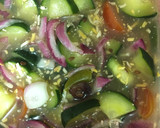A picture of step 3 of Marinated Cucumber Red Onion Salad.