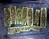 A picture of step 4 of Minced chicken pesto marrow boat.