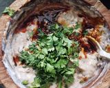 A picture of step 4 of Eggplant bharata with curd.
