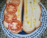 A picture of step 3 of Cochinitos Sandwich with Rustic Bread and Tomato.