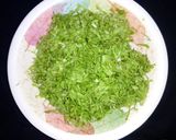 A picture of step 1 of Nigerian rice with salad.