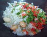 Foto del paso 3 de la receta: Arroz con azafrán y calamares