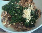 A picture of step 3 of Sautéed Spinach and Mushroom with Garlic.