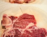 A picture of step 1 of Grilled T~Bone Steak 🥩.
