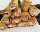 Foto del paso 5 de la receta: Rollitos de pan de molde con queso y pavo