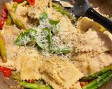 A picture of step 3 of Ravioli with tomatoes and asparagus.