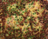 Foto del paso 8 de la receta: Tortilla de guisantes 🫛 con cebolla 🧅 y jamón