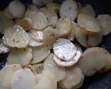 A picture of step 4 of Aalu katali with dry fruits fast special.