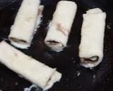 A picture of step 5 of French toast filled with chocolate and banana.