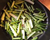 A picture of step 5 of Miso roasted squash with ginger garlic tofu and greens - vegan.
