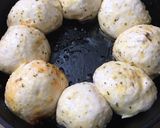 A picture of step 5 of Cheesy garlic bread meatball ring.