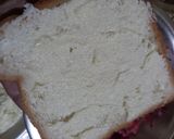 A picture of step 2 of Cheese spread bread toast.