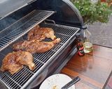 A picture of step 5 of Grilled chicken laps.