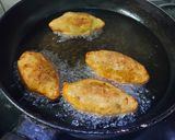 A picture of step 4 of Ranga Aloor Puli Pithe or Sweet Potato Fried Dumplings.