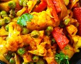 A picture of step 5 of Cauliflower, Potato, Peas, and Carrot Curry.