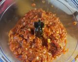 A picture of step 7 of Completely homemade chicken madras pizzas.