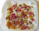 A picture of step 4 of Fruity nutty frozen yogurt bars.
