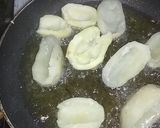 A picture of step 3 of Cheesy chilli potato cups.
