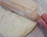 Foto del paso 7 de la receta: Pizza gigante de atún enrollada